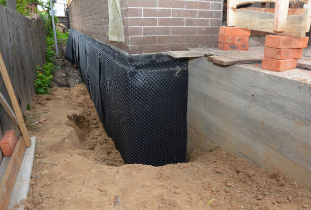 SJ Waterproofing Pros technician performing targeted Waterproofing assessment in Kingsville, MD